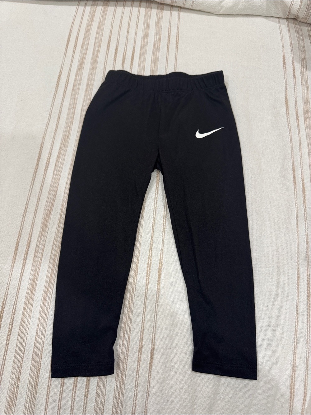 Nike Kids Black Leggings with White Swoosh